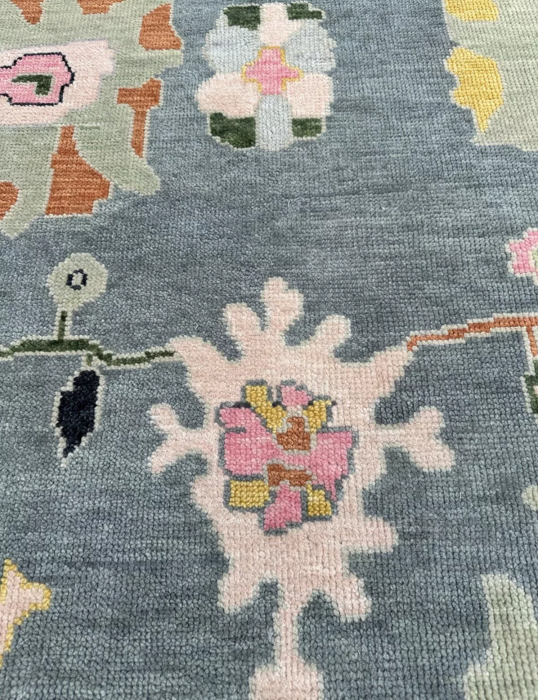 Hand Knotted Oushak Rug – Blue Turkish Wool Area Rug with Pastel Floral Motifs