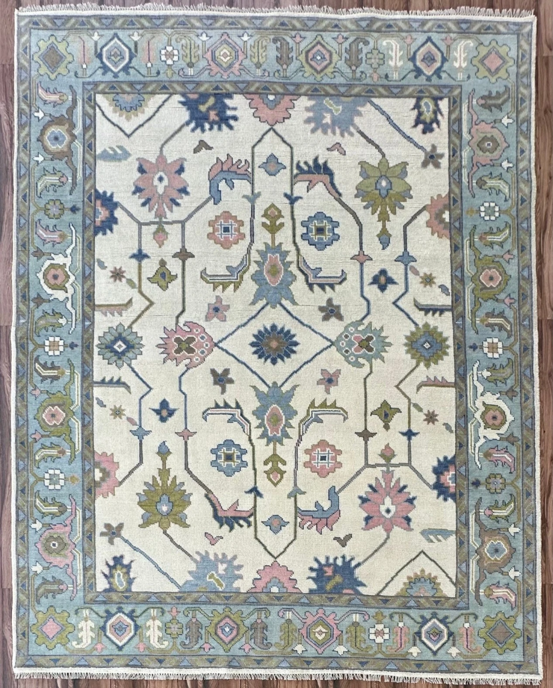 Hand Knotted Oushak Rug – Ivory Turkish Wool Area Rug with Soft Pastel Motifs