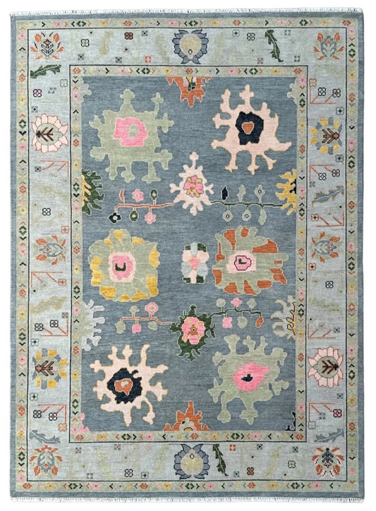 Hand Knotted Oushak Rug – Blue Turkish Wool Area Rug with Pastel Floral Motifs